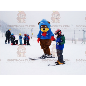 BIGGYMONKEY™ mascot costume of brown and yellow bear in ski