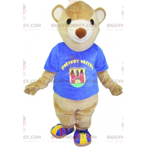 BIGGYMONKEY™ mascottekostuum van een beige beer met een blauw