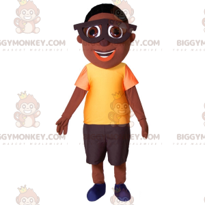 BIGGYMONKEY™ Ung afrikansk pojkemaskotdräkt med stora glasögon