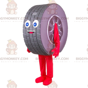 Costume de mascotte BIGGYMONKEY™ de pneu géant très souriant.