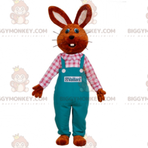Bunny BIGGYMONKEY™ mascot costume dressed in overalls. Farmer