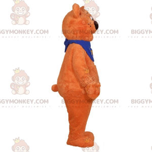 Měkký a roztomilý kostým maskota oranžového medvídka