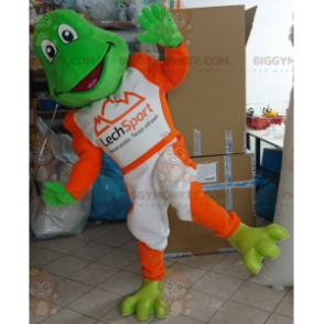 Grön groda BIGGYMONKEY™ maskotdräkt klädd i vitt och orange -