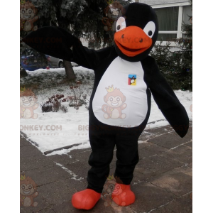 Mustavalkoinen oranssi pingviini BIGGYMONKEY™ maskottiasu.