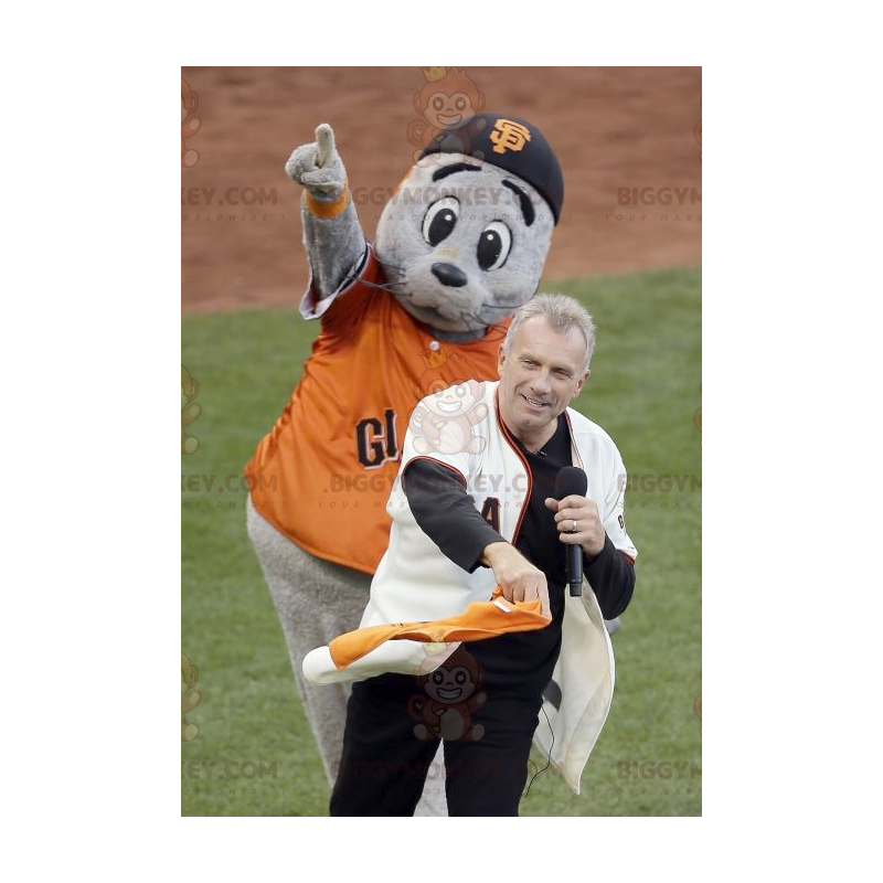 Gray sea lion mascot with an orange t-shirt - Sizes L (175-180CM)