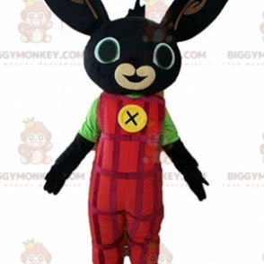 Sort kanin BIGGYMONKEY™ maskotkostume klædt i røde overalls -