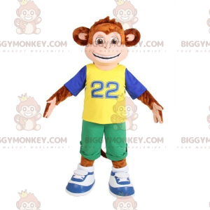 Brun abe BIGGYMONKEY™ maskotkostume klædt i farverigt outfit -