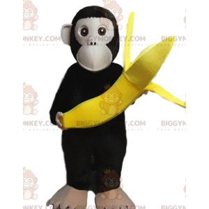 BIGGYMONKEY™ mascot costume of monkey carrying a banana, baboon