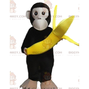 BIGGYMONKEY™ mascottekostuum van aap die een banaan draagt