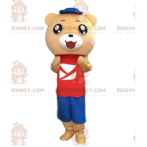 Costume beige colored teddy bear in colorful outfit -