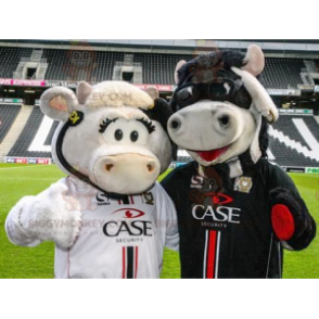 2 krávy maskot BIGGYMONKEY™, jedna bílá a jedna černá –