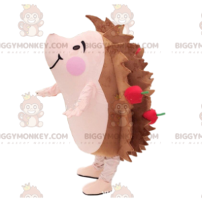 Fantasia de mascote de ouriço marrom e rosa com maçãs