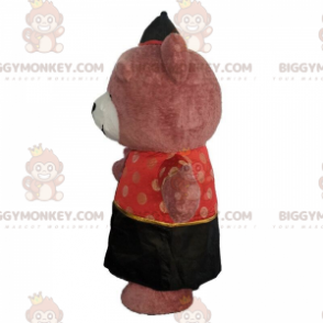 Costume da orso gonfiabile vestito con un abito asiatico -