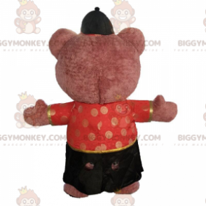 Costume da orso gonfiabile vestito con un abito asiatico -