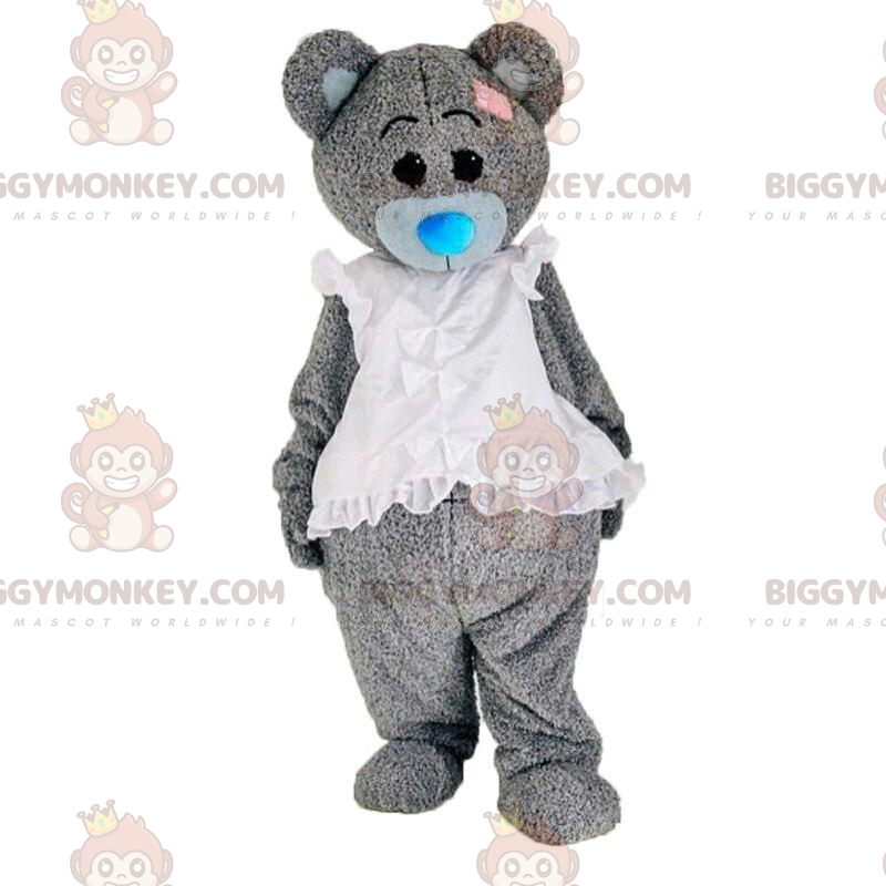 Teddy bear costume dressed in a white dress, elegant bear –