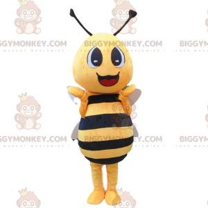 Yellow and black bee costume, giant and smiling -