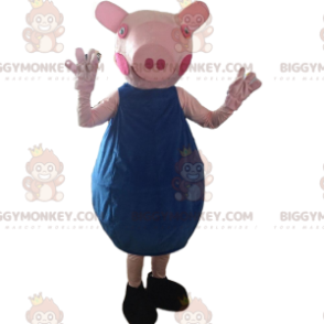 Déguisement de cochon rose avec une tenue bleu - Biggymonkey.com