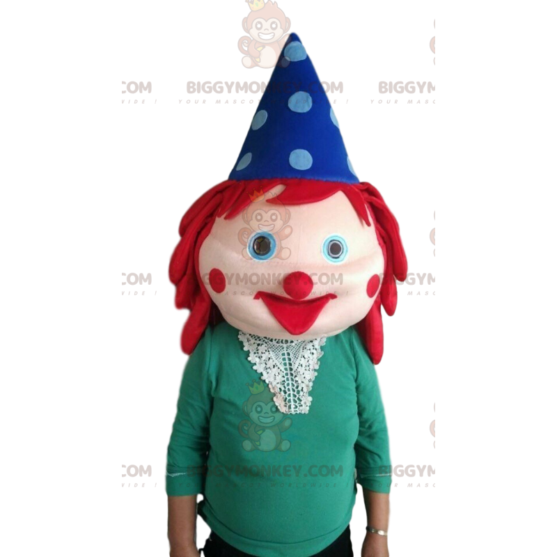 Gigantisch clownshoofd met rood haar en een hoed -
