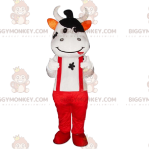 Disfraz de vaca con tirantes y pantalón rojo. - Biggymonkey.com