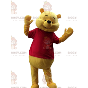 Kostým veselého medvídka Pú s maskotem BIGGYMONKEY™ s červeným