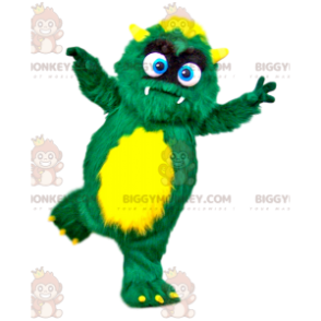 Traje de mascote do pequeno monstro peludo verde e amarelo