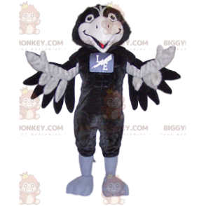 Erittäin hymyilevä mustavalkoinen Crow BIGGYMONKEY™ maskottiasu