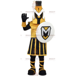 Kostým maskota BIGGYMONKEY™ žlutočerného válečníka se štítem. –