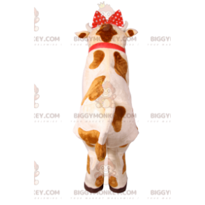 BIGGYMONKEY™ cow mascot costume with red polka dot bow. cow