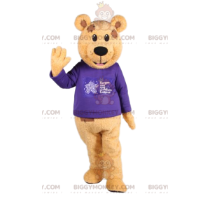 Brown bear BIGGYMONKEY™ mascot costume with blue jersey. bear