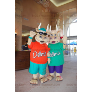 2 BIGGYMONKEY™s beige cow mascots in colorful outfits -