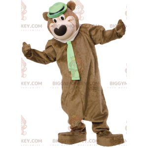 Brown Bear BIGGYMONKEY™ maskottiasu, jossa hattu ja solmio -