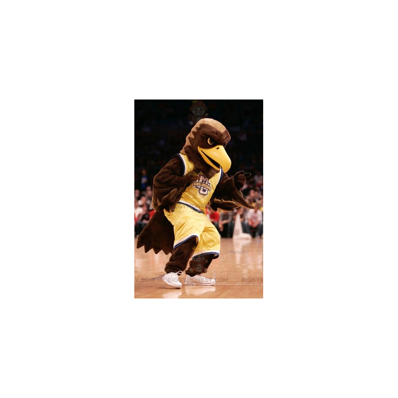 Brown Eagle BIGGYMONKEY™ maskotkostume klædt i gult sportstøj -