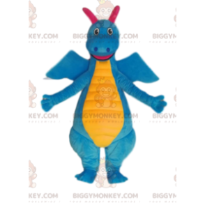 Hyvin hymyilevä sininen ja keltainen dinosaurus BIGGYMONKEY™