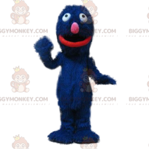 Traje de mascote de monstro azul peludo e brincalhão