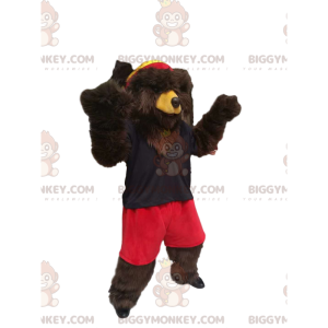 Brown Bear BIGGYMONKEY™ maskottiasu punaisilla shortsilla ja