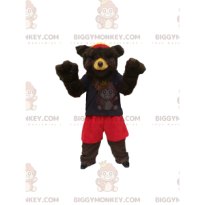 Brown Bear BIGGYMONKEY™ maskottiasu punaisilla shortsilla ja
