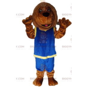 Brunt lejon BIGGYMONKEY™ maskotdräkt med blåa sportkläder -