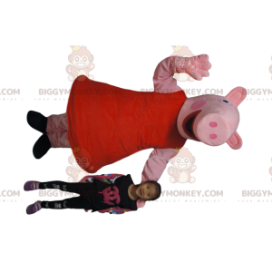 Meget smilende gris BIGGYMONKEY™ maskotkostume med rød kjole -