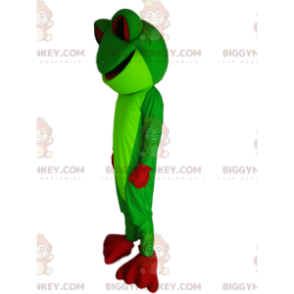 Neonowo zielona żaba z czerwonymi oczami i łapami -