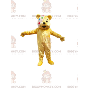 BIGGYMONKEY™ maskotdräkt Liten gul unge med flerfärgat bandage