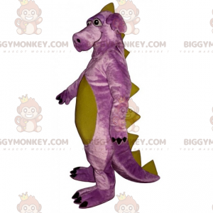 Kostium maskotki z dużymi nogami i fioletowym dinozaurem