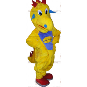 BIGGYMONKEY™ maskottiasu, keltainen dinosaurus sinisellä