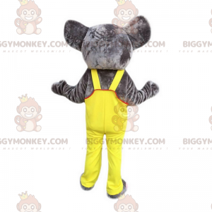 Elephant BIGGYMONKEY™ maskottiasu keltaisilla haalareilla -