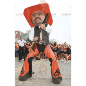 Cowboy BIGGYMONKEY™ maskotdräkt i orange och svart traditionell