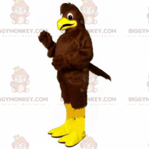 Kostium maskotki z brązowym ptakiem i żółtymi nogami