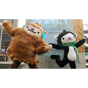 2 BIGGYMONKEY™s mascot a brown yeti and a black and white