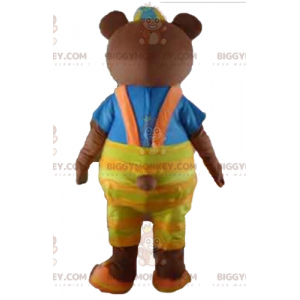 Brun björn BIGGYMONKEY™ maskotdräkt med gul overall och t-shirt