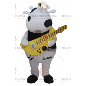 BIGGYMONKEY™ Mascottekostuum Zwart-witte koe met gele gitaar -