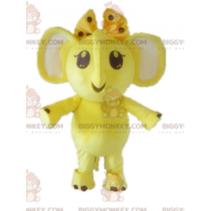 Kostým maskota BIGGYMONKEY™ Žlutý a bílý slon s mašlí na hlavě