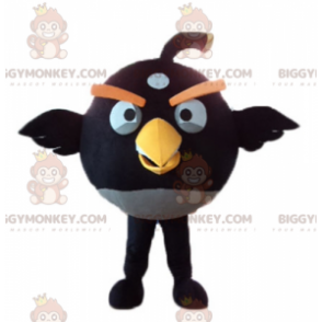 BIGGYMONKEY™ maskotdräkt av svart och gul fågel från det